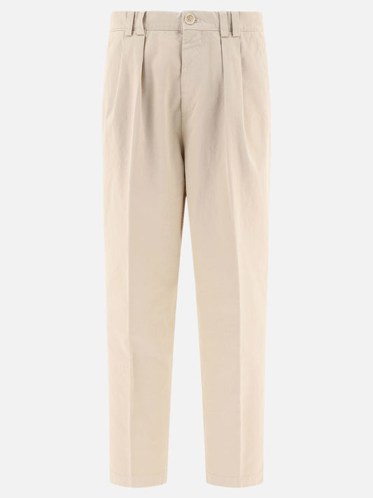 Trousers with reversed double pleats