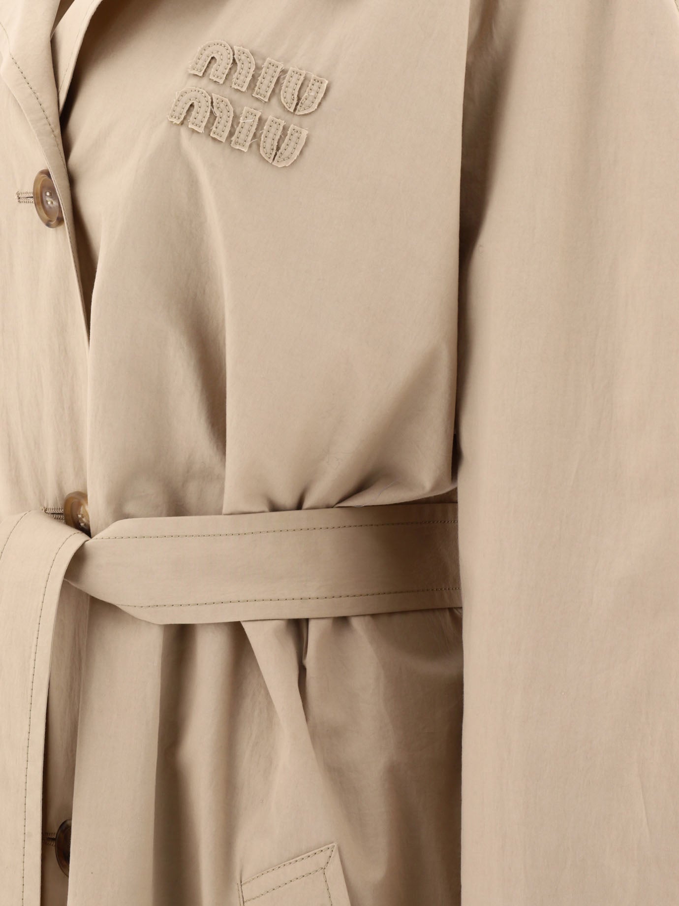 Miu Miu Double-breasted rain coat with logo Beige