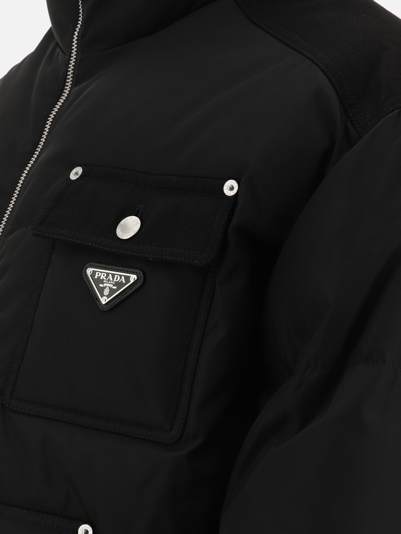 Down jacket with cargo-style pockets