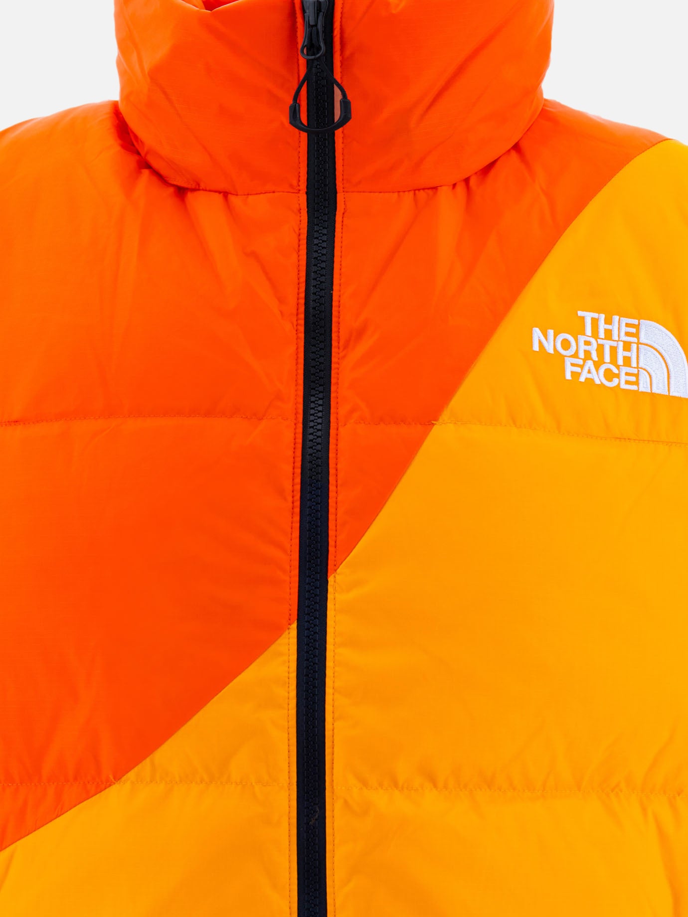 "TNF X Yinka Ilori" down vest